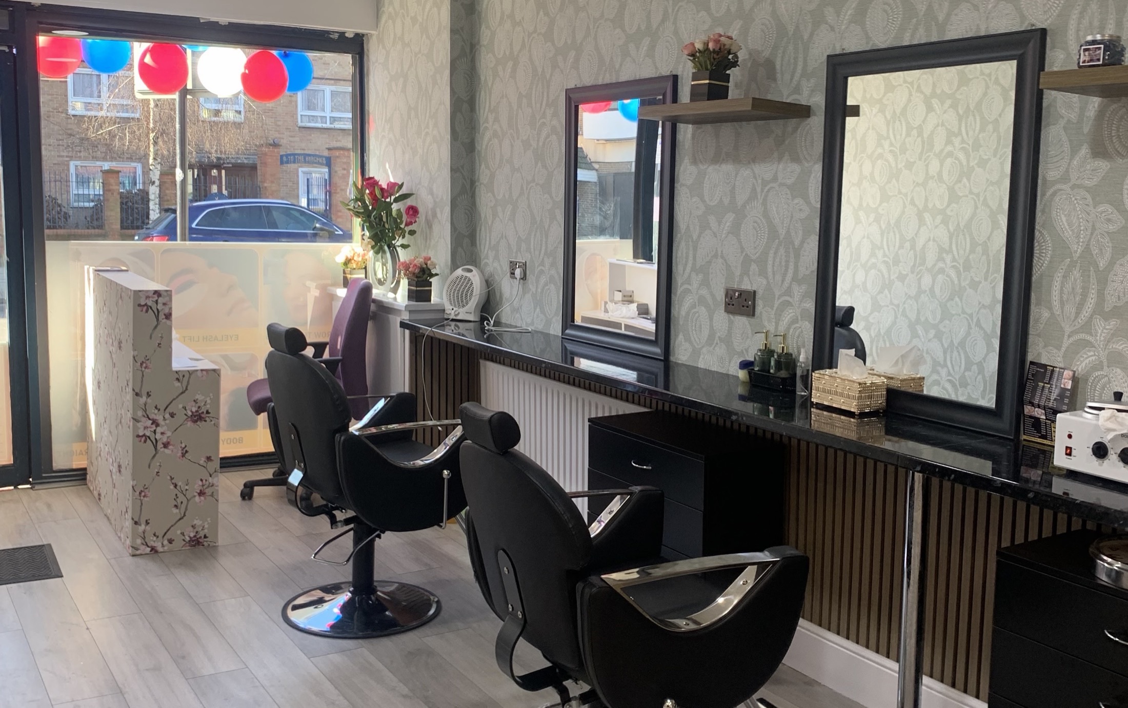 Styling chairs and mirrors inside Glow Ritual Salon, Manor Park